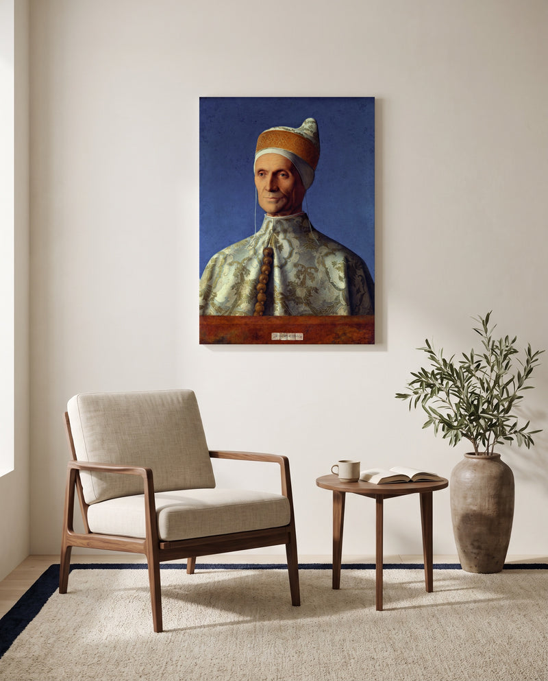Doge Leonardo Loredan by Giovanni Bellini as a stretched canvas above a linen lounge chair in a reading corner