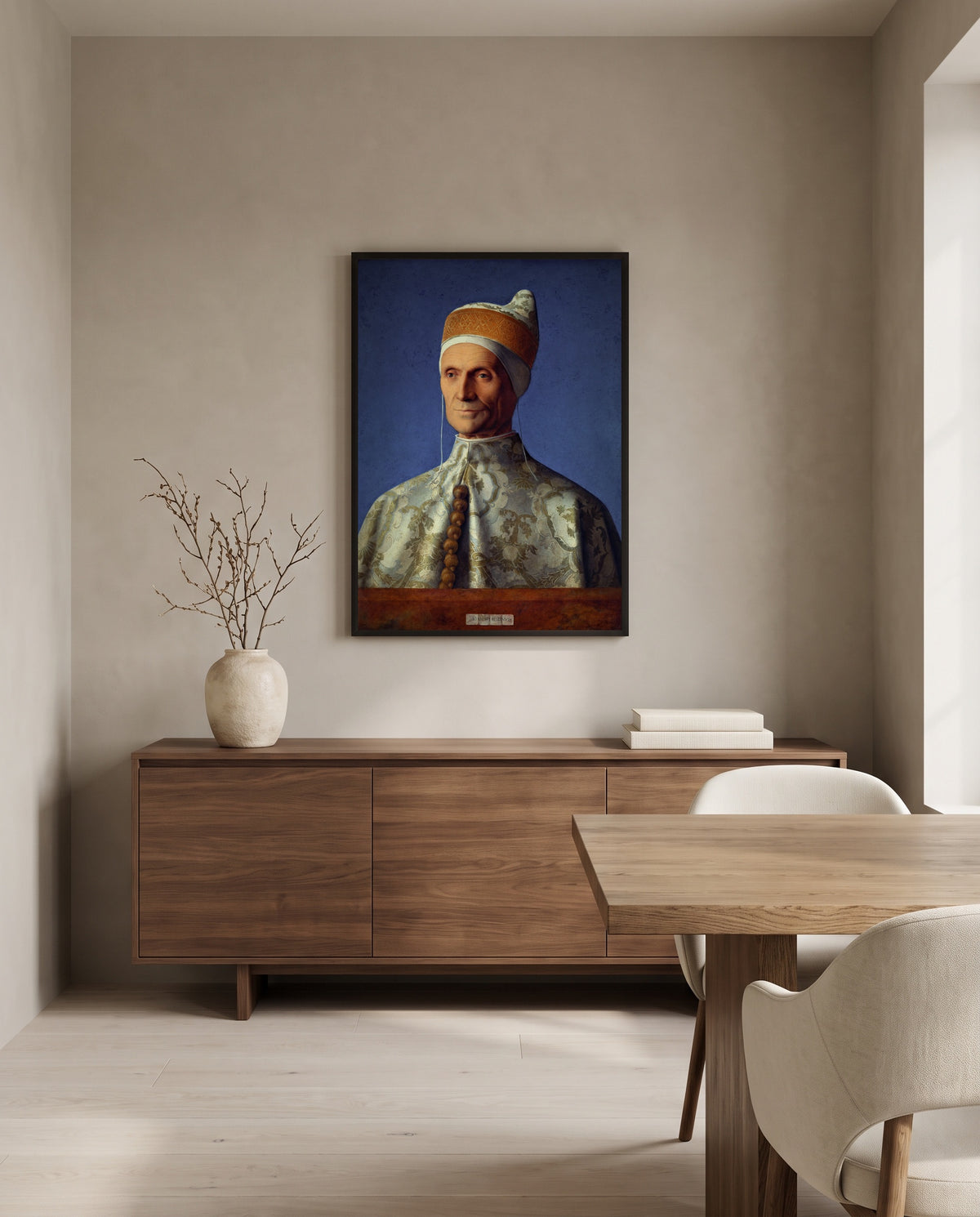 Doge Leonardo Loredan by Giovanni Bellini in a black frame above a walnut sideboard in a dining room
