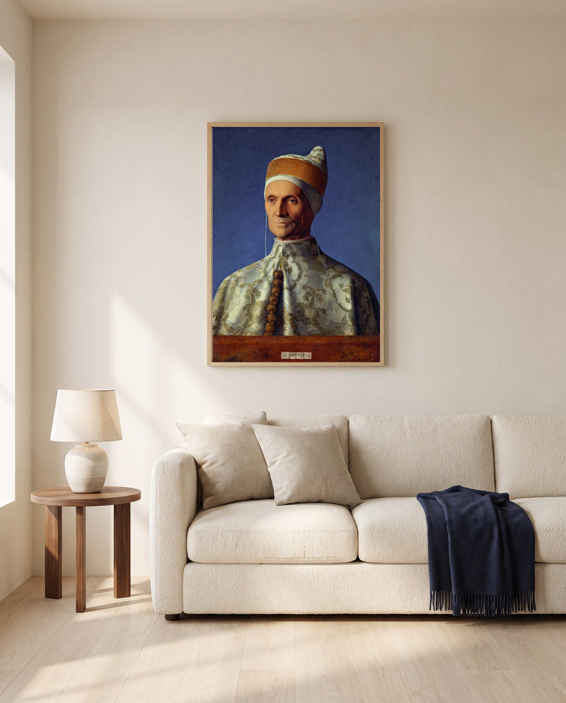 Doge Leonardo Loredan by Giovanni Bellini framed in natural oak above a cream sofa in a warm living room