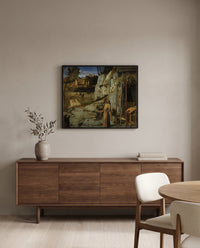 St Francis in the Desert by Giovanni Bellini in a black frame above a walnut sideboard in a dining room