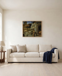 St Francis in the Desert by Giovanni Bellini framed in natural oak above a cream sofa in a warm living room