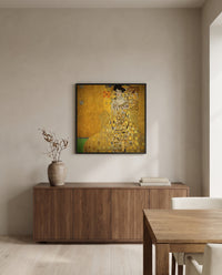 Adele Bloch-Bauer I by Gustav Klimt in a black frame above a walnut sideboard in a dining room