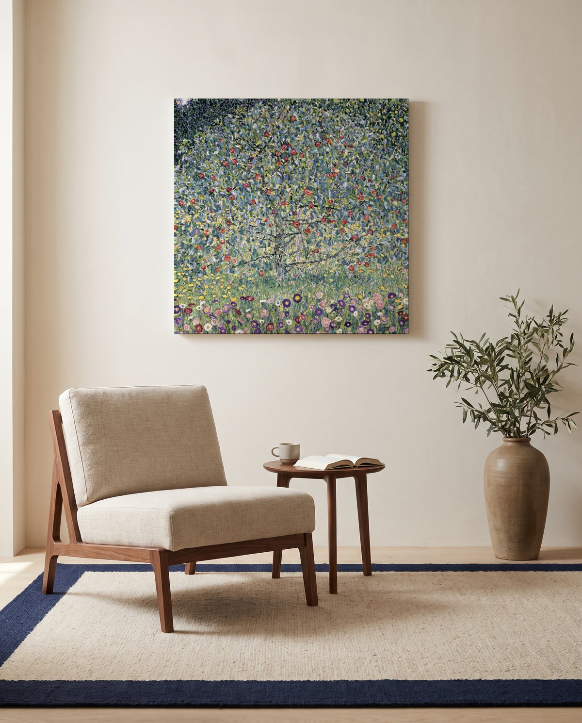 Apple Tree I by Gustav Klimt as a stretched canvas above a linen lounge chair in a reading corner