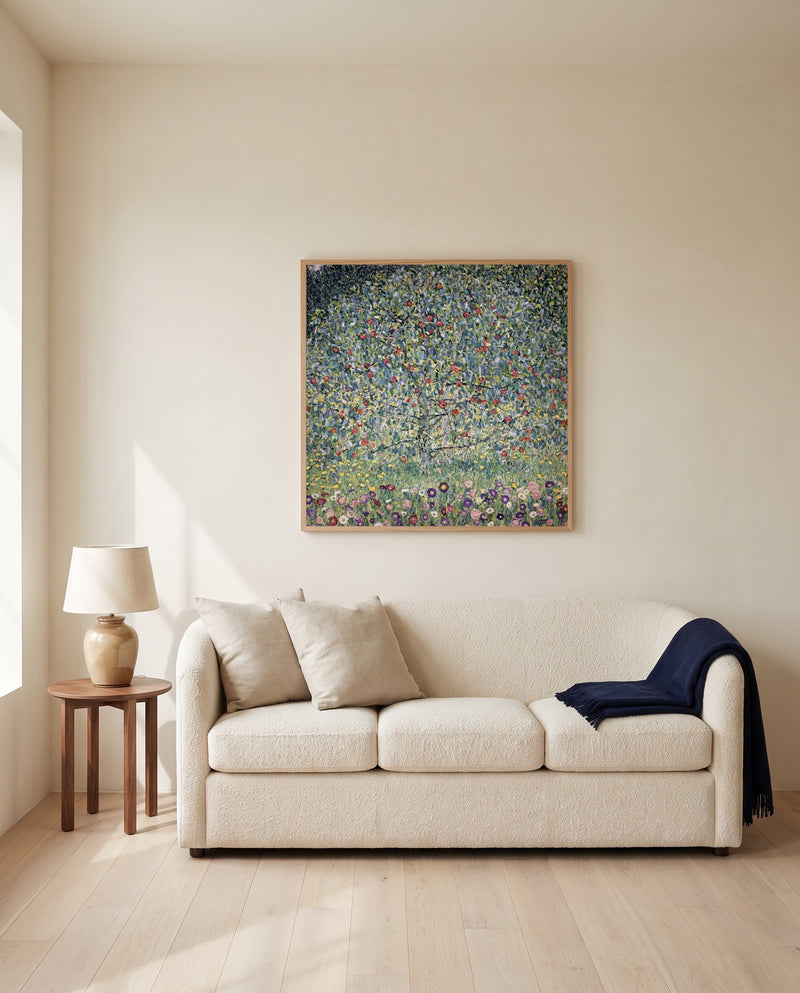 Apple Tree I by Gustav Klimt framed in natural oak above a cream sofa in a warm living room