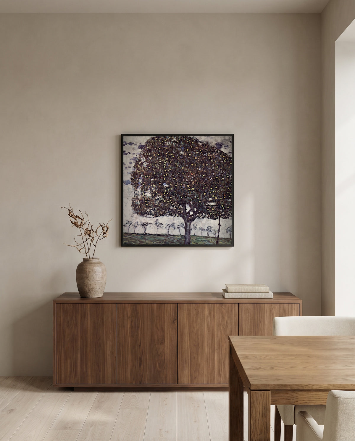 Apple Tree II by Gustav Klimt in a black frame above a walnut sideboard in a dining room