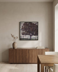 Apple Tree II by Gustav Klimt in a black frame above a walnut sideboard in a dining room