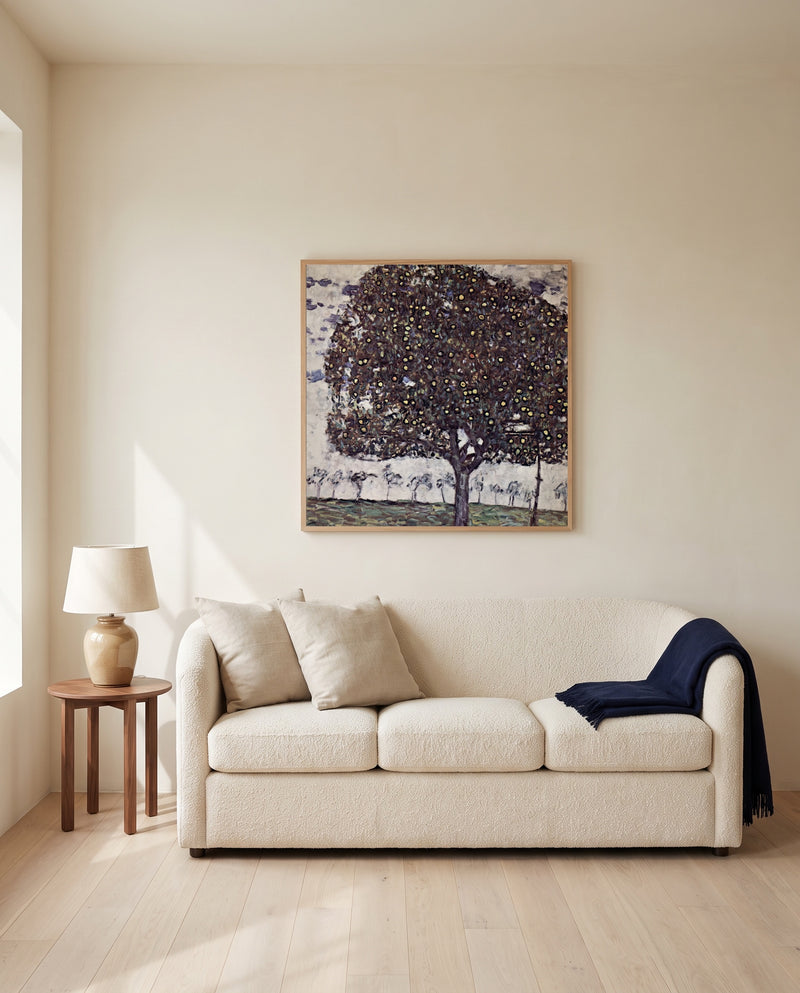 Apple Tree II by Gustav Klimt framed in natural oak above a cream sofa in a warm living room
