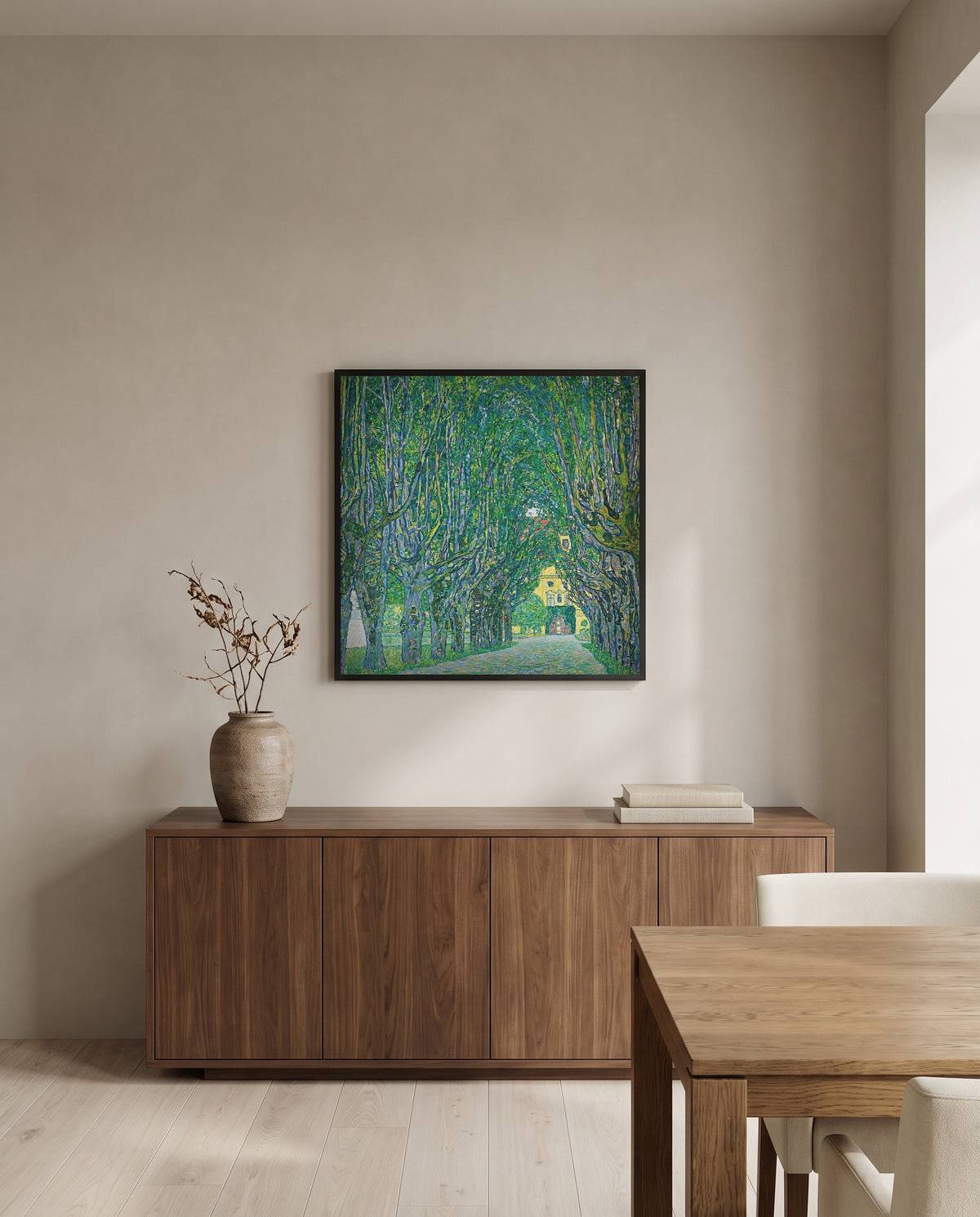 Avenue to Schloss Kammer by Gustav Klimt in a black frame above a walnut sideboard in a dining room