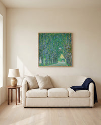 Avenue to Schloss Kammer by Gustav Klimt framed in natural oak above a cream sofa in a warm living room