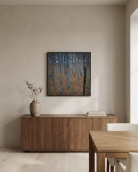 Beech Grove I by Gustav Klimt in a black frame above a walnut sideboard in a dining room