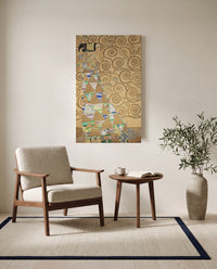 Expectation by Gustav Klimt as a stretched canvas above a linen lounge chair in a reading corner