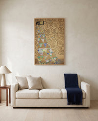 Expectation by Gustav Klimt framed in natural oak above a cream sofa in a warm living room