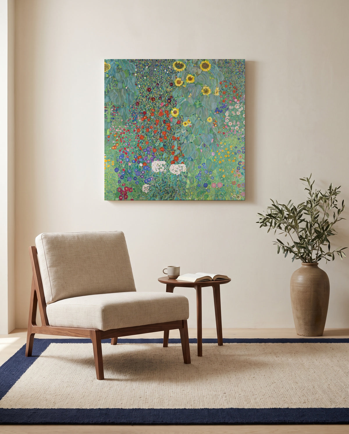Farm Garden with Sunflowers by Gustav Klimt as a stretched canvas above a linen lounge chair in a reading corner