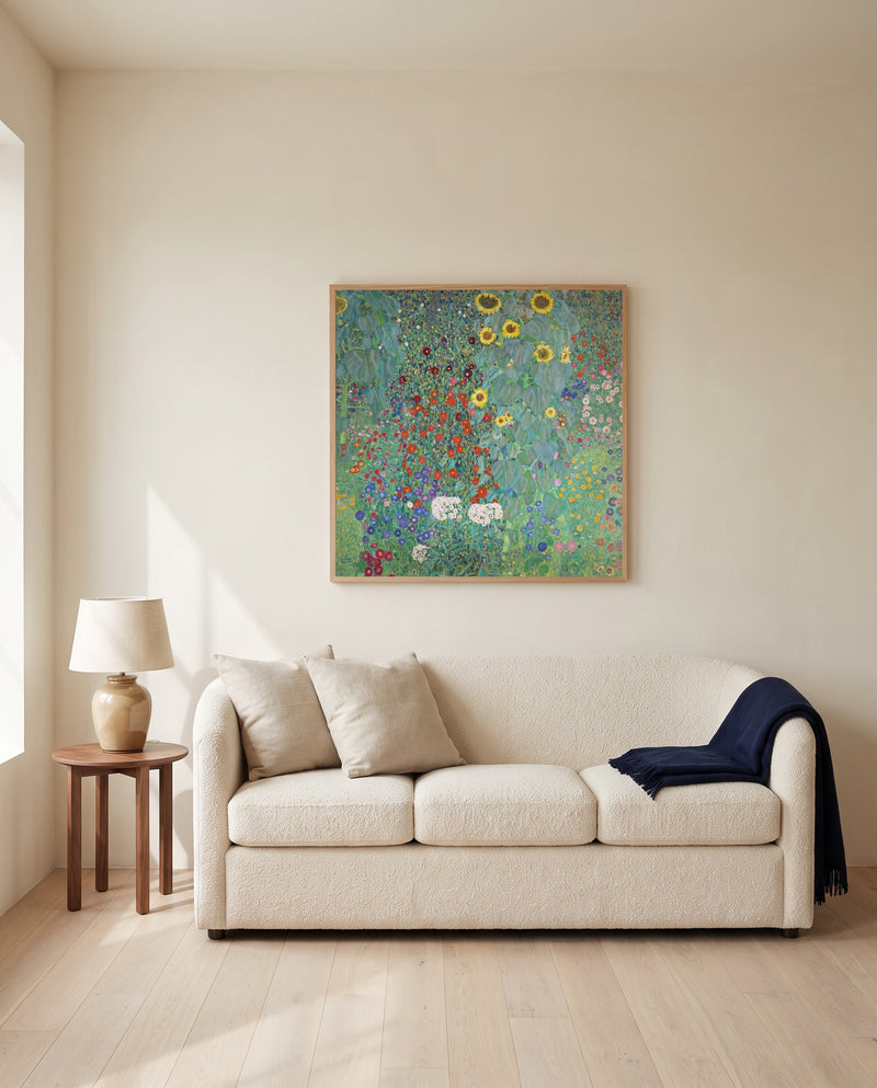 Farm Garden with Sunflowers by Gustav Klimt framed in natural oak above a cream sofa in a warm living room
