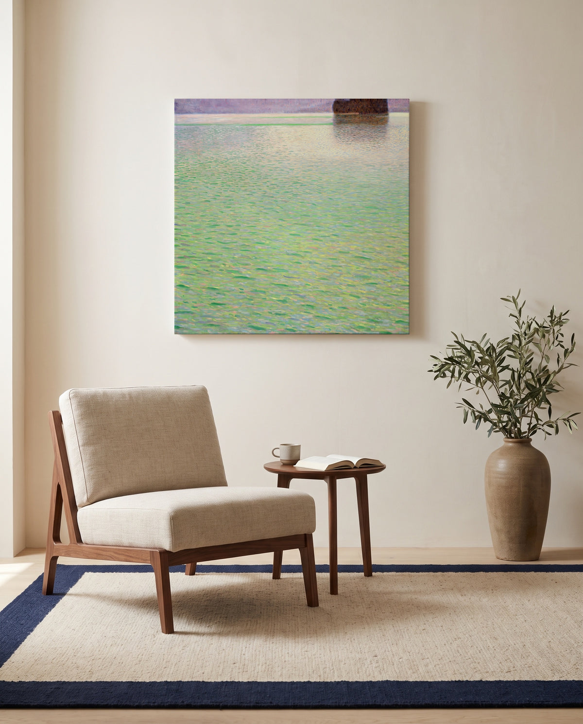 Insel im Attersee by Gustav Klimt as a stretched canvas above a linen lounge chair in a reading corner