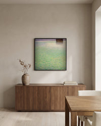 Insel im Attersee by Gustav Klimt in a black frame above a walnut sideboard in a dining room