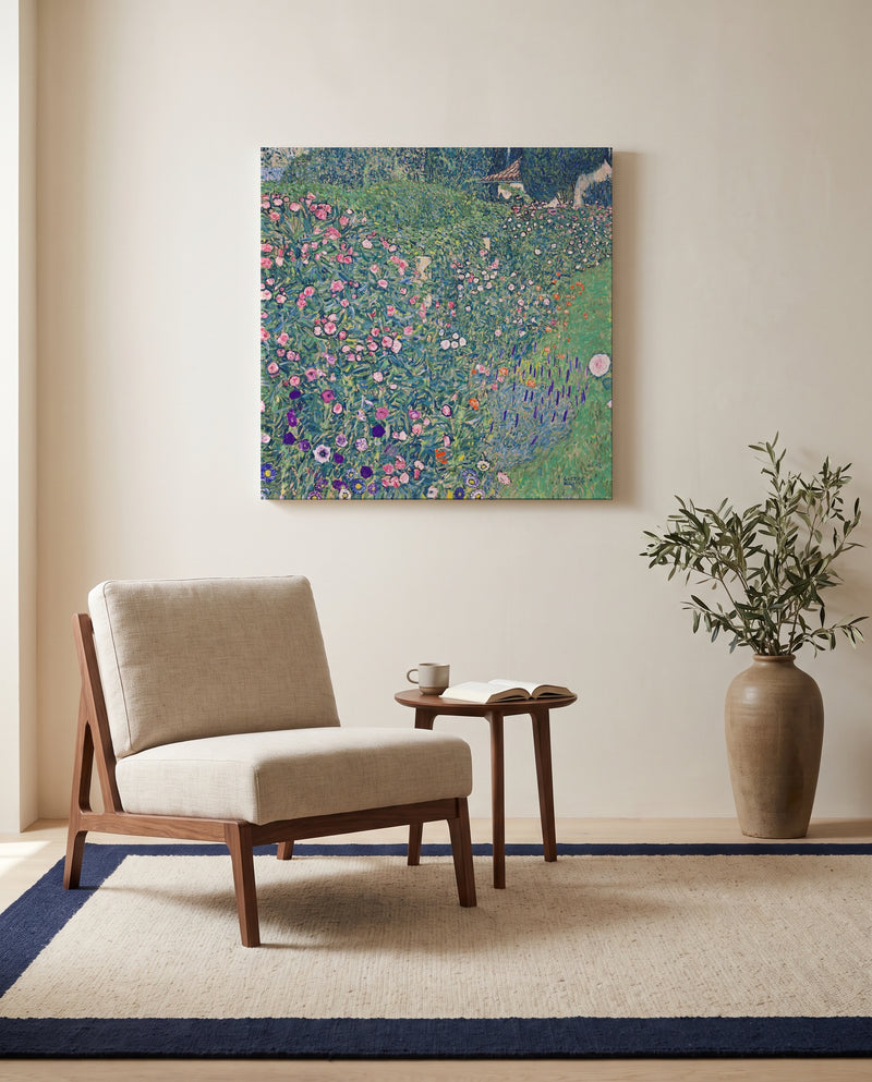Italian Garden Landscape by Gustav Klimt as a stretched canvas above a linen lounge chair in a reading corner