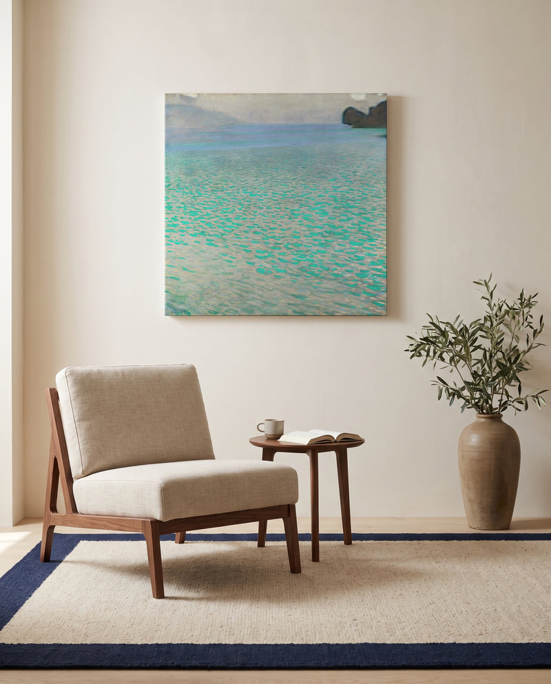 On Lake Attersee by Gustav Klimt as a stretched canvas above a linen lounge chair in a reading corner