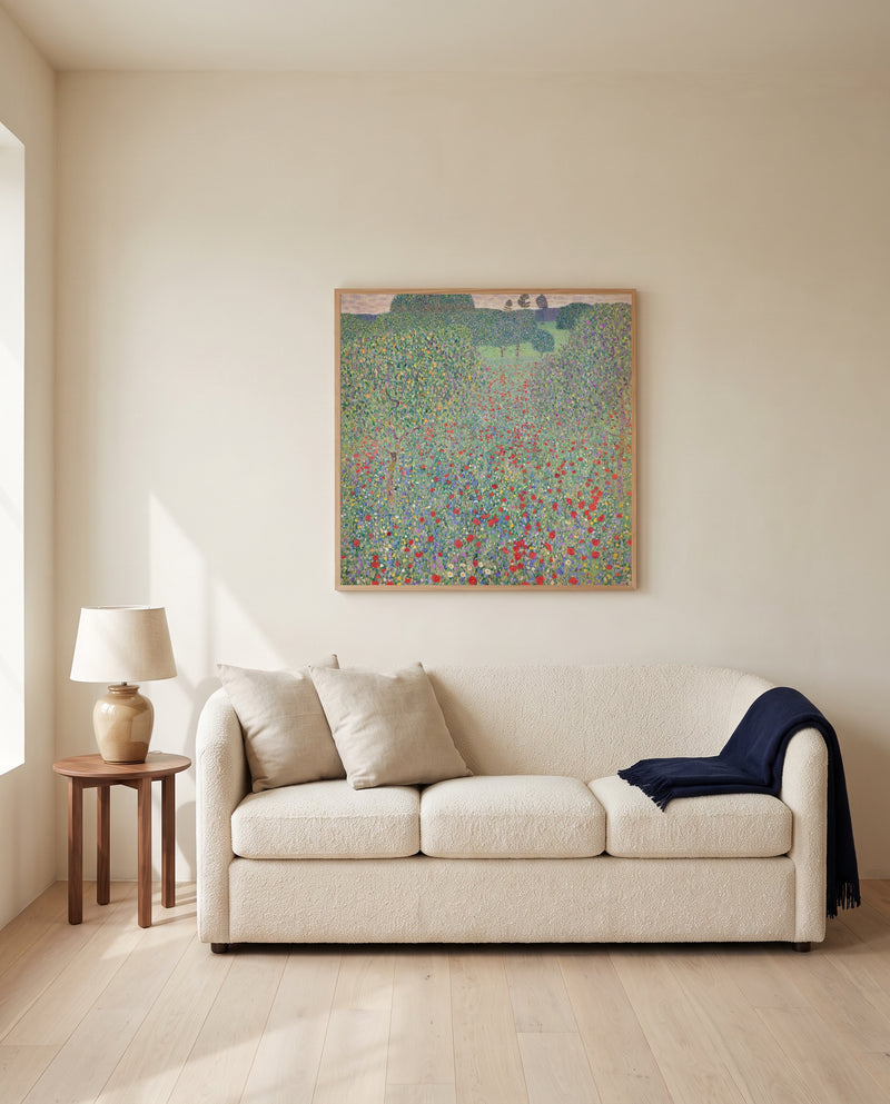Poppy Field by Gustav Klimt framed in natural oak above a cream sofa in a warm living room