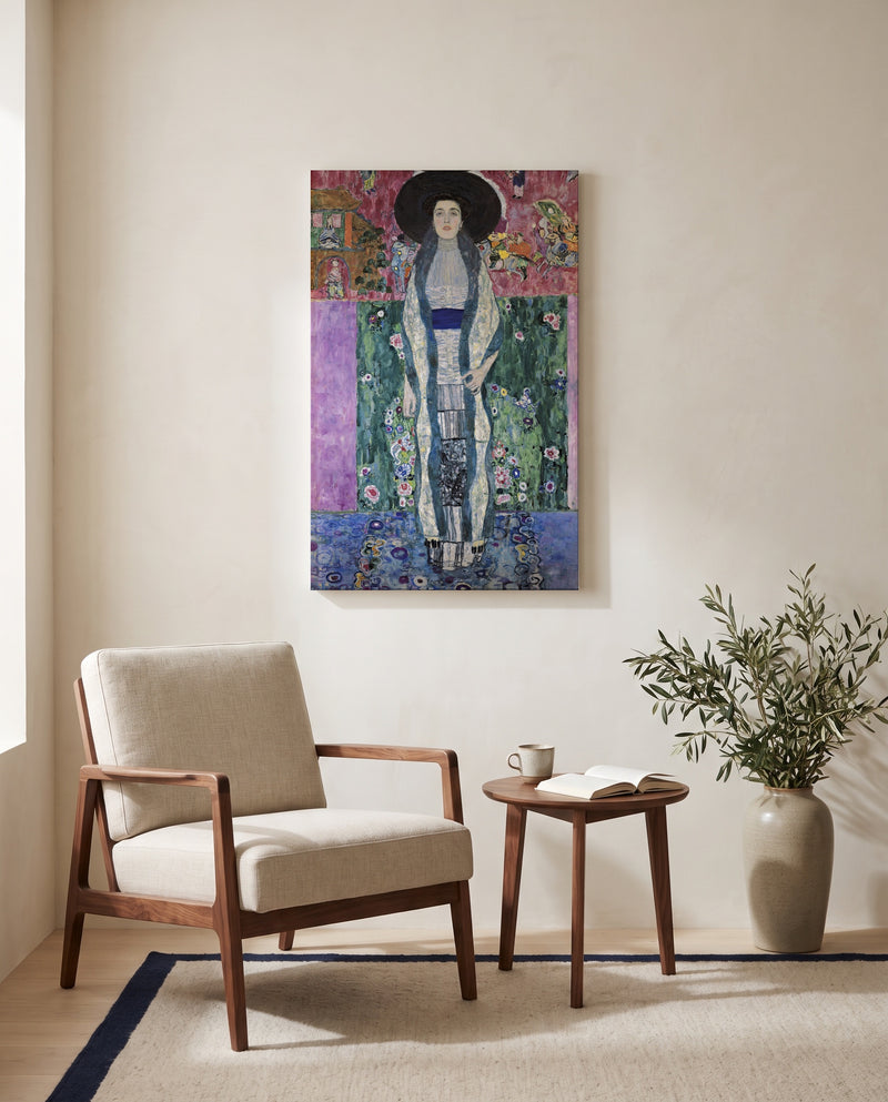 Adele Bloch-Bauer II by Gustav Klimt as a stretched canvas above a linen lounge chair in a reading corner