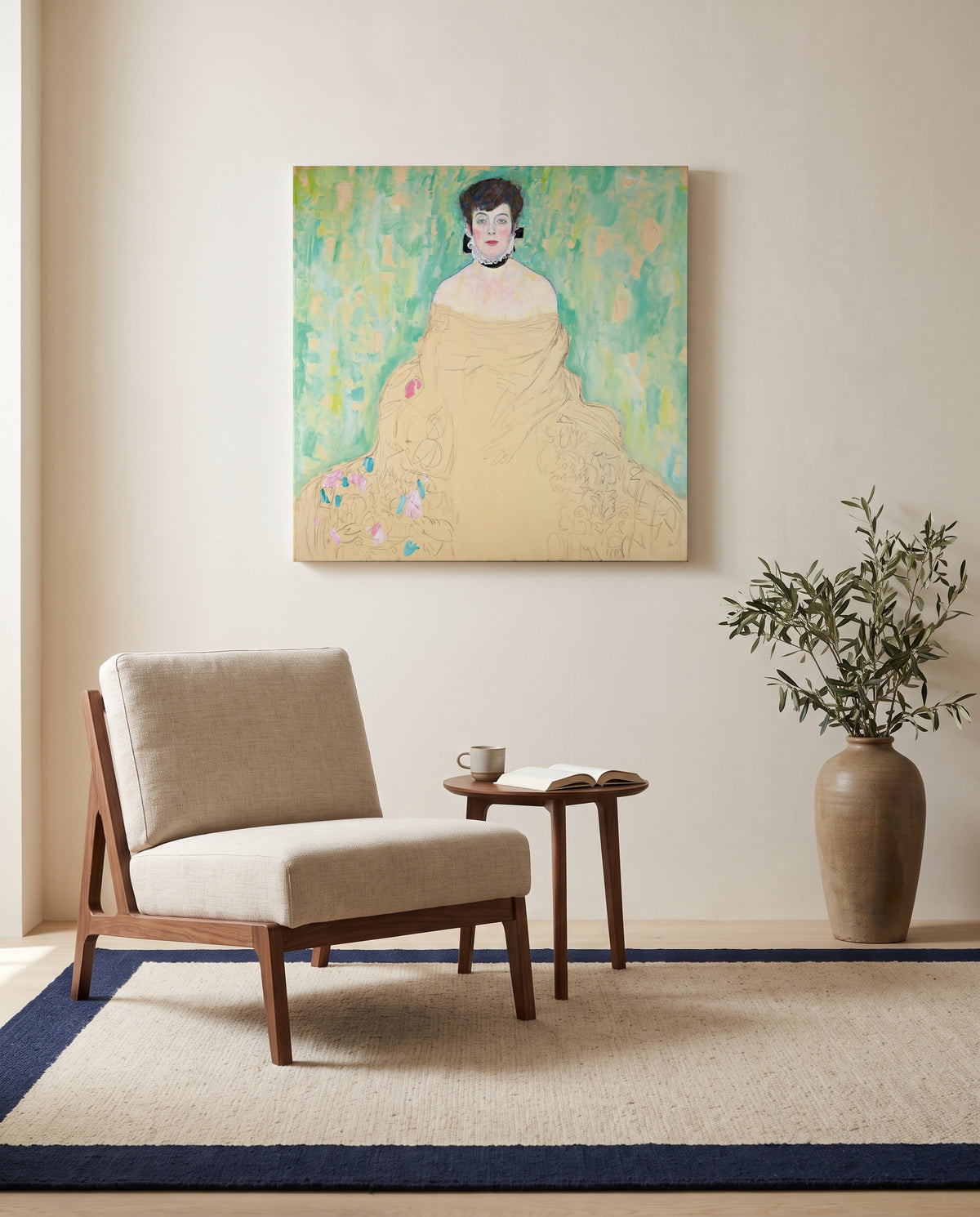 Amalie Zuckerkandl by Gustav Klimt as a stretched canvas above a linen lounge chair in a reading corner