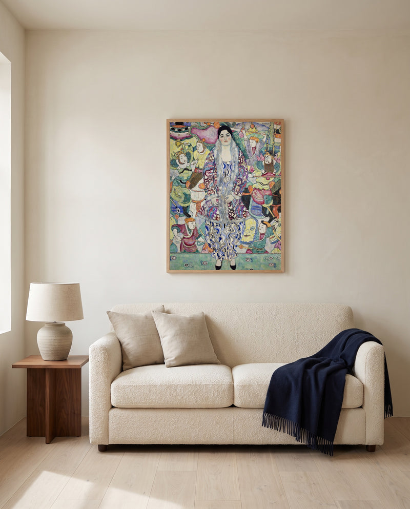 Friederike Maria Beer by Gustav Klimt framed in natural oak above a cream sofa in a warm living room