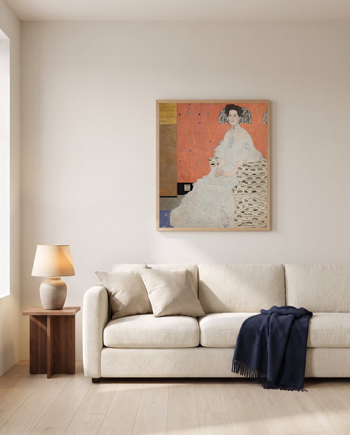Fritza Riedler by Gustav Klimt framed in natural oak above a cream sofa in a warm living room