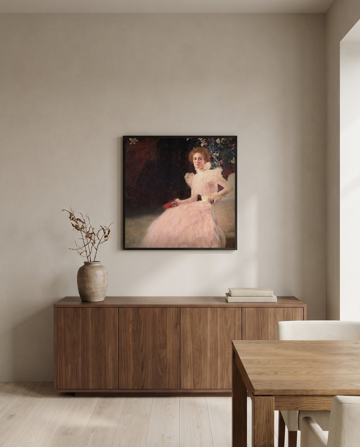 Sonja Knips by Gustav Klimt in a black frame above a walnut sideboard in a dining room