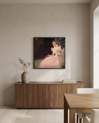 Sonja Knips by Gustav Klimt in a black frame above a walnut sideboard in a dining room