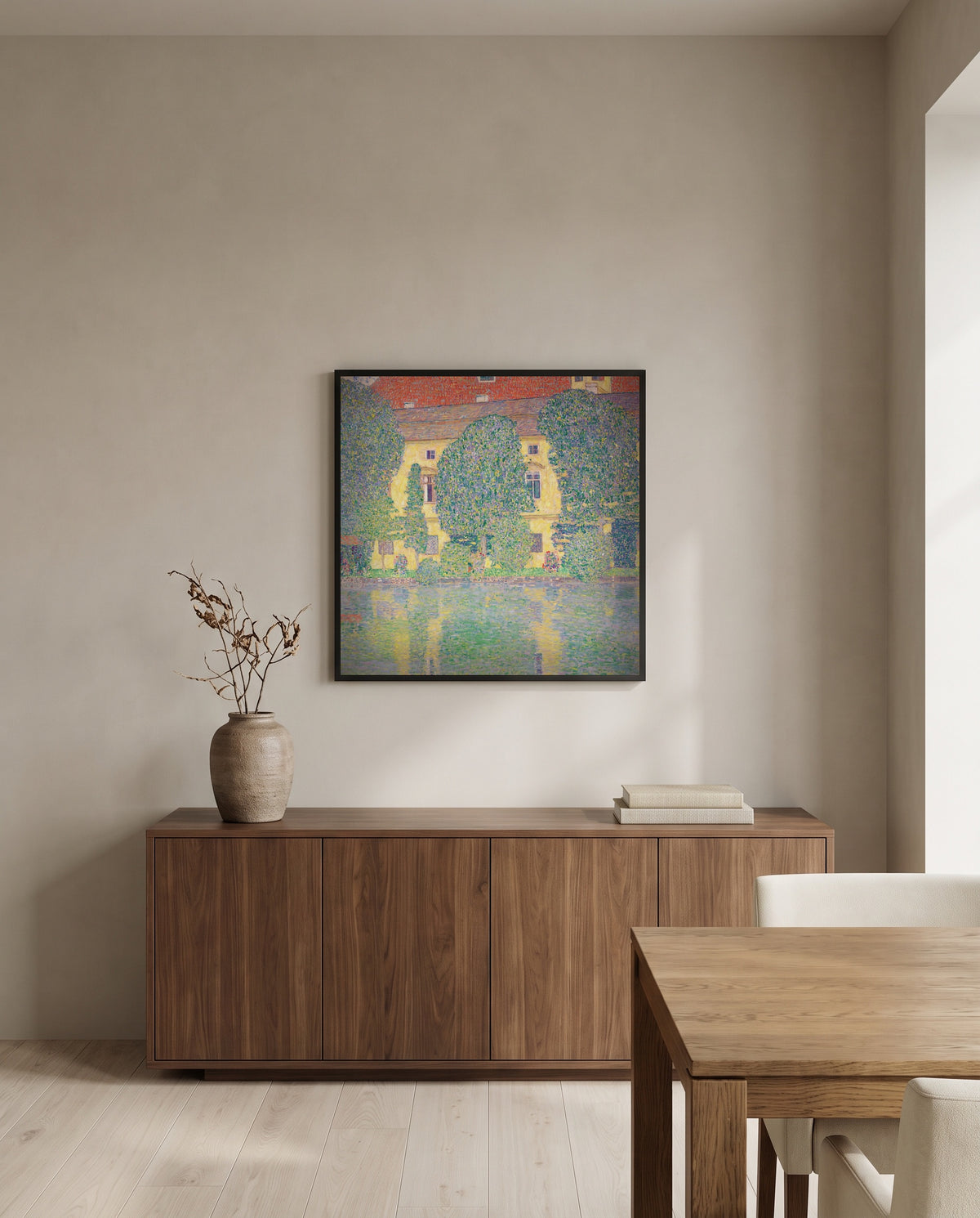 Schloss Kammer III by Gustav Klimt in a black frame above a walnut sideboard in a dining room