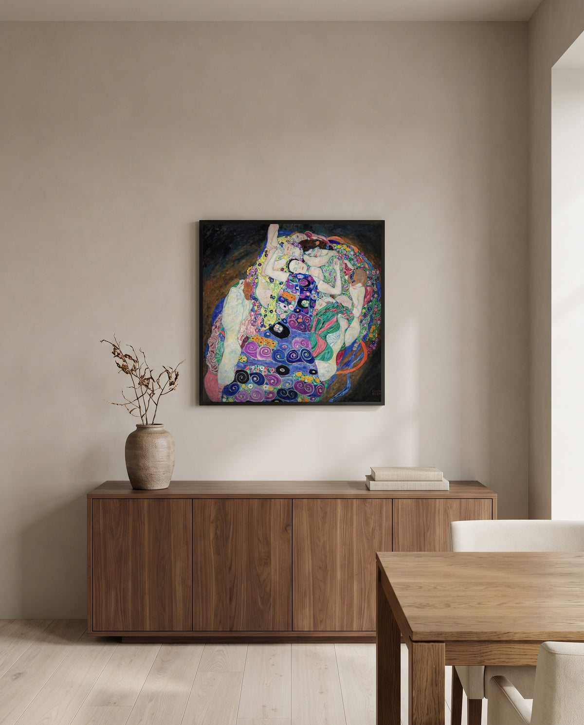 The Maiden by Gustav Klimt in a black frame above a walnut sideboard in a dining room