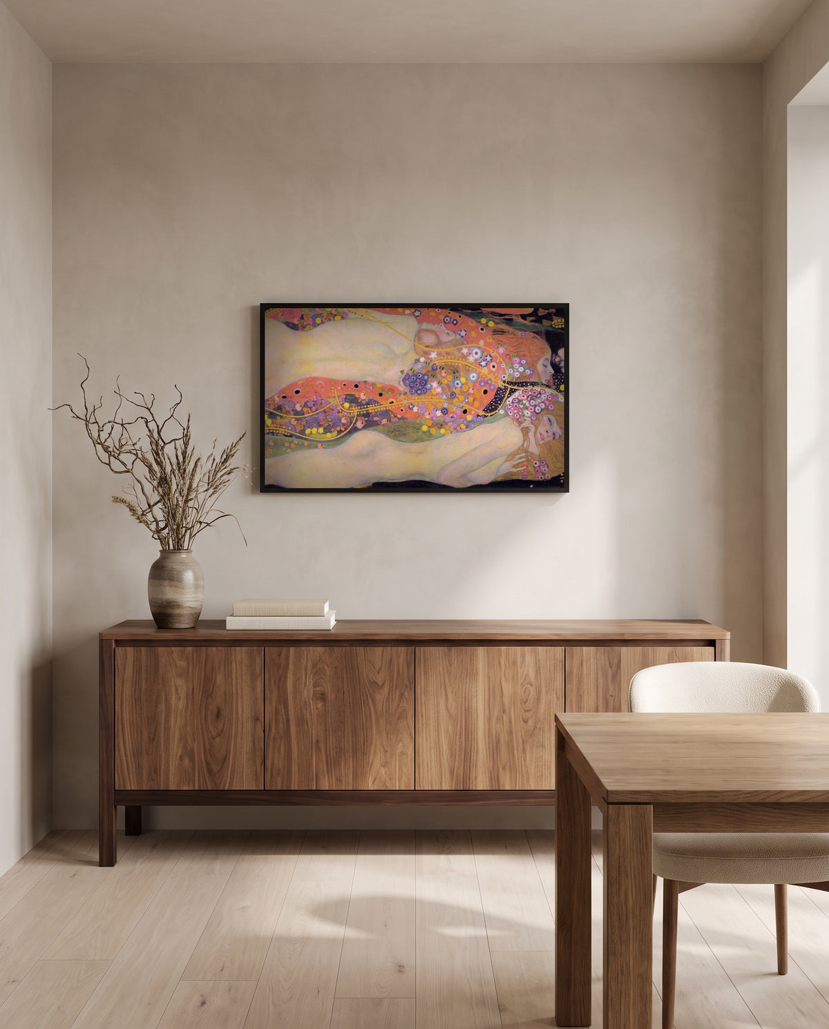 Water Serpents II by Gustav Klimt in a black frame above a walnut sideboard in a dining room