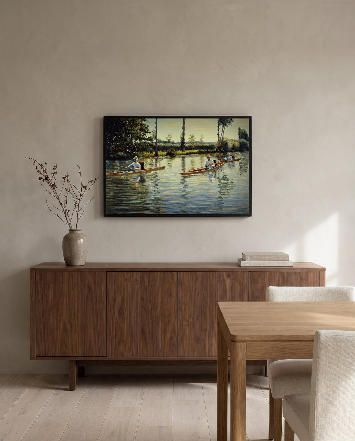 Boating on the Yerres by Gustave Caillebotte in a black frame above a walnut sideboard in a dining room