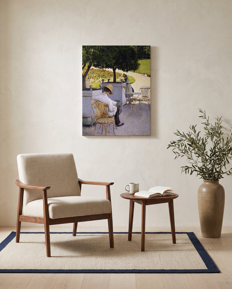 The Orange Trees by Gustave Caillebotte as a stretched canvas above a linen lounge chair in a reading corner