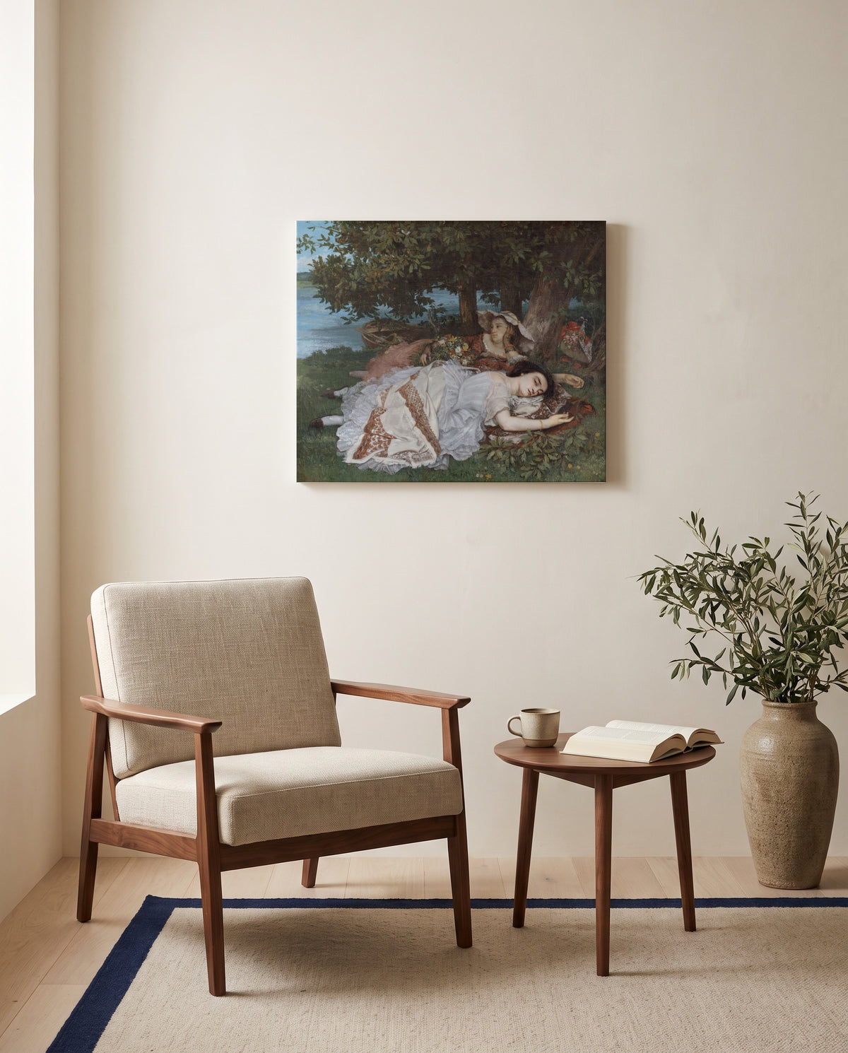 Young Ladies by the Seine by Gustave Courbet as a stretched canvas above a linen lounge chair in a reading corner