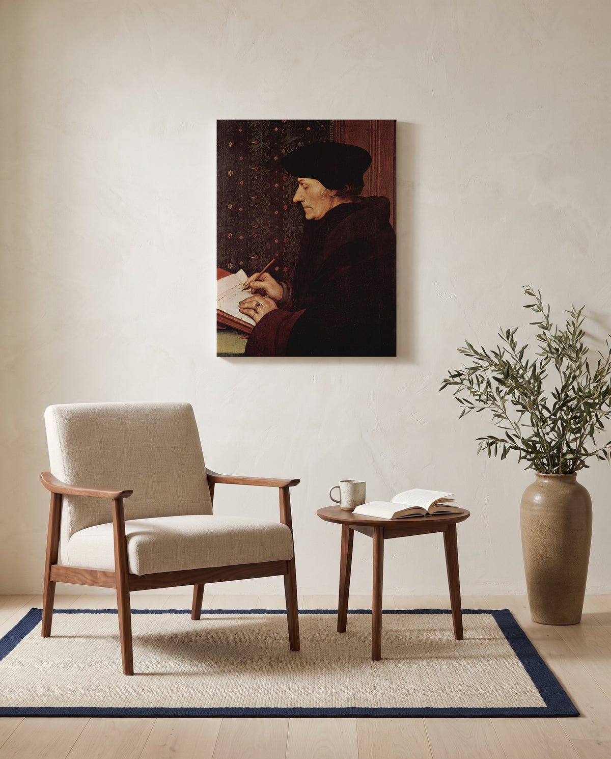 Erasmus Writing by Hans Holbein the Younger as a stretched canvas above a linen lounge chair in a reading corner