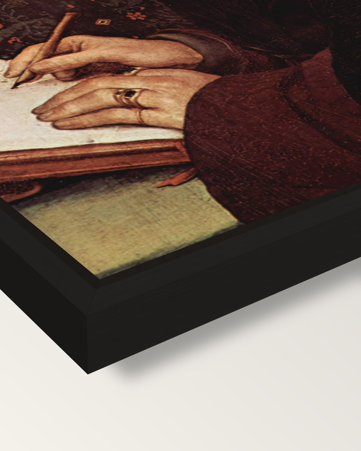 Erasmus Writing by the Younger framed canvas, corner close-up: a black floating frame with a shadow gap round the canvas