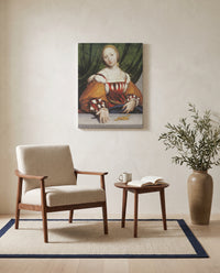 Lais of Corinth by Hans Holbein the Younger as a stretched canvas above a linen lounge chair in a reading corner