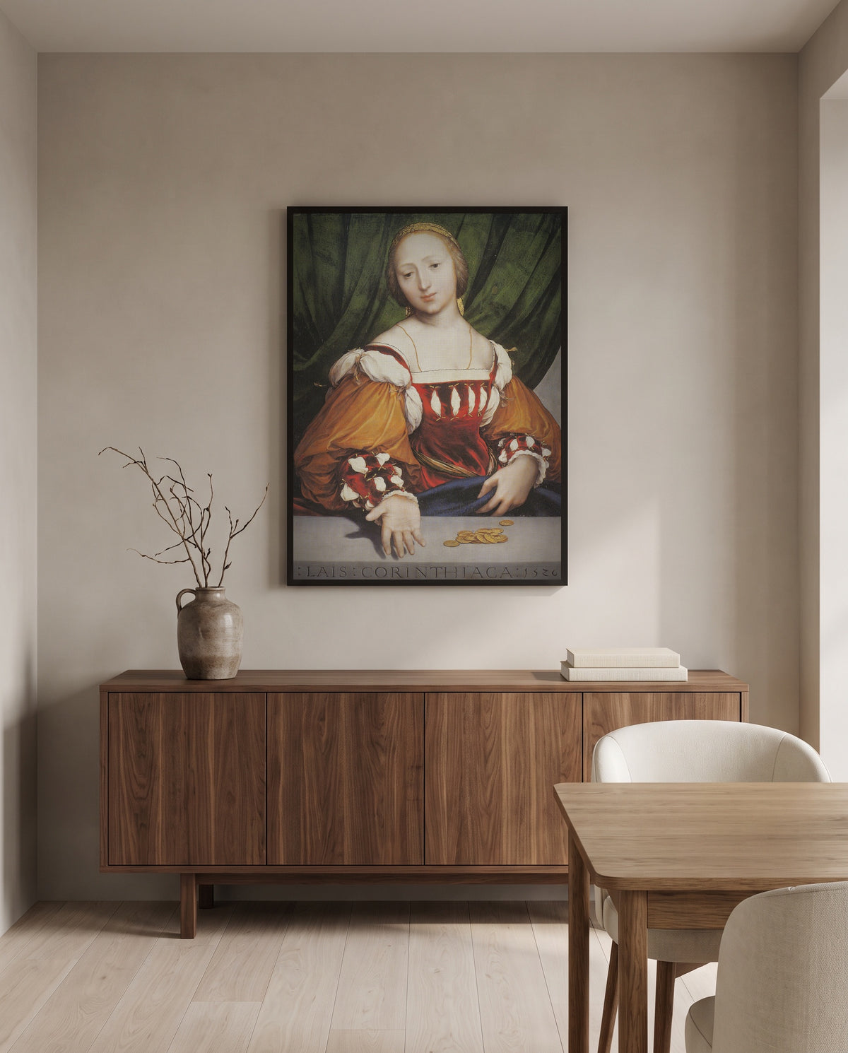 Lais of Corinth by Hans Holbein the Younger in a black frame above a walnut sideboard in a dining room