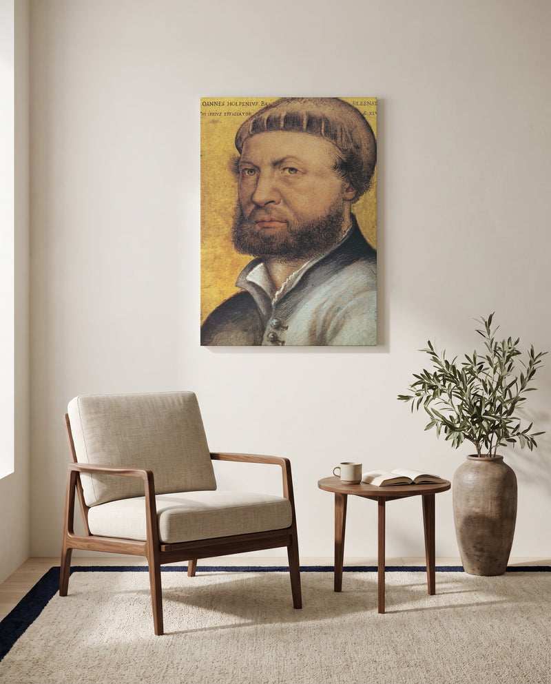 Self-Portrait by Hans Holbein the Younger as a stretched canvas above a linen lounge chair in a reading corner
