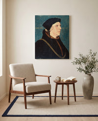 Sir William Butts by Hans Holbein the Younger as a stretched canvas above a linen lounge chair in a reading corner