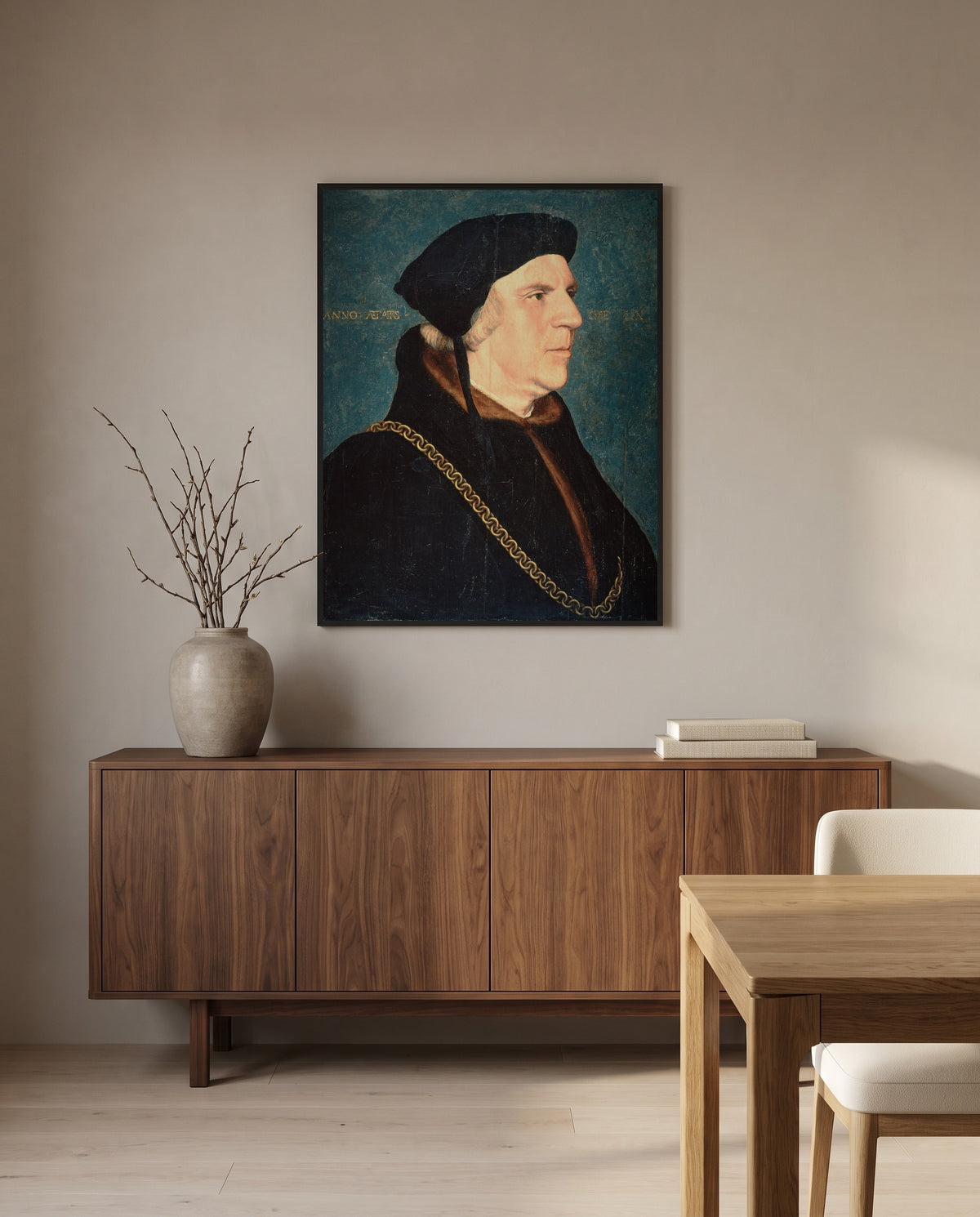 Sir William Butts by Hans Holbein the Younger in a black frame above a walnut sideboard in a dining room
