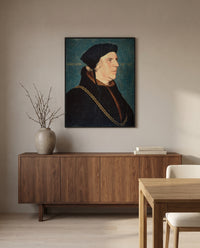 Sir William Butts by Hans Holbein the Younger in a black frame above a walnut sideboard in a dining room