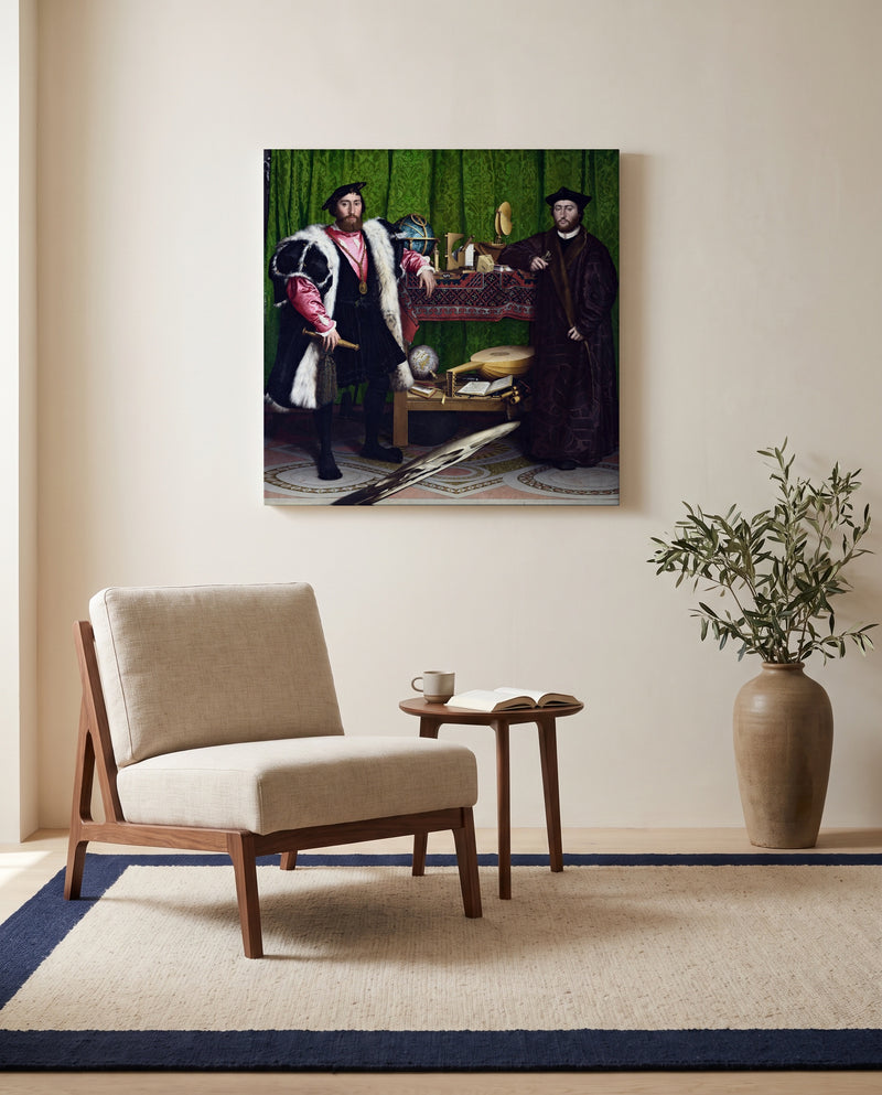 The Ambassadors by Hans Holbein the Younger as a stretched canvas above a linen lounge chair in a reading corner