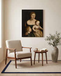 The Artist’s Family by Hans Holbein the Younger as a stretched canvas above a linen lounge chair in a reading corner