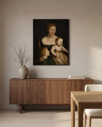 The Artist’s Family by Hans Holbein the Younger in a black frame above a walnut sideboard in a dining room
