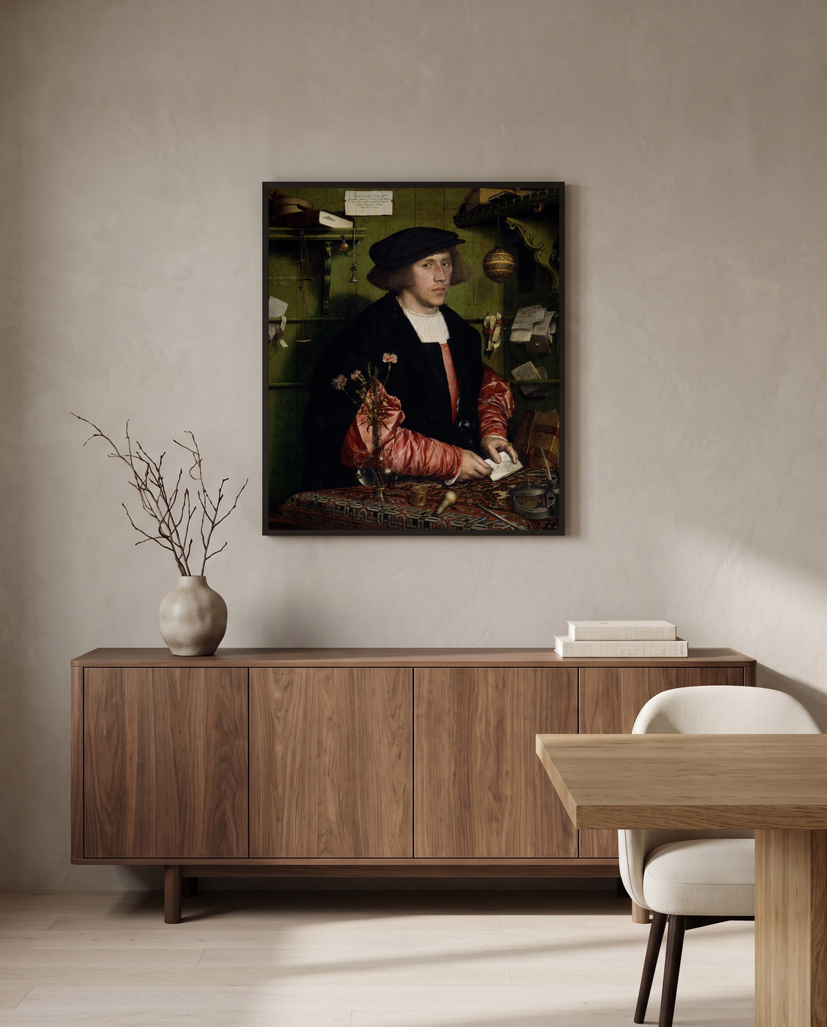 The Merchant Georg Gisze by Hans Holbein the Younger in a black frame above a walnut sideboard in a dining room