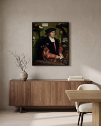 The Merchant Georg Gisze by Hans Holbein the Younger in a black frame above a walnut sideboard in a dining room