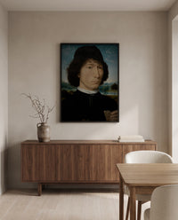 Man with a Roman Coin by Hans Memling in a black frame above a walnut sideboard in a dining room