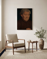 Old Man by Hans Memling as a stretched canvas above a linen lounge chair in a reading corner
